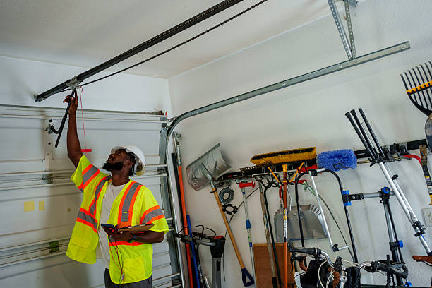 Professional Garage Door Panel Replacement technician working in Falls City, OR